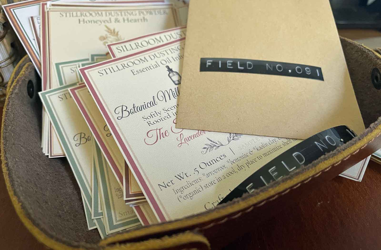 Field No.091 kraft envelope with Stillroom Dusting Powder cards — part of the Lizzy Lane Farm Stillroom Archive, where scent and story are preserved by hand.