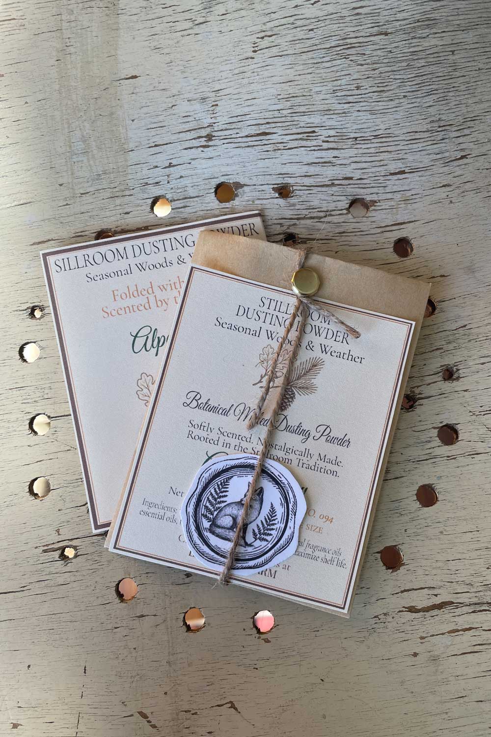 Alpen Glow Season Dusting Powder sample size with fragment edition information card series