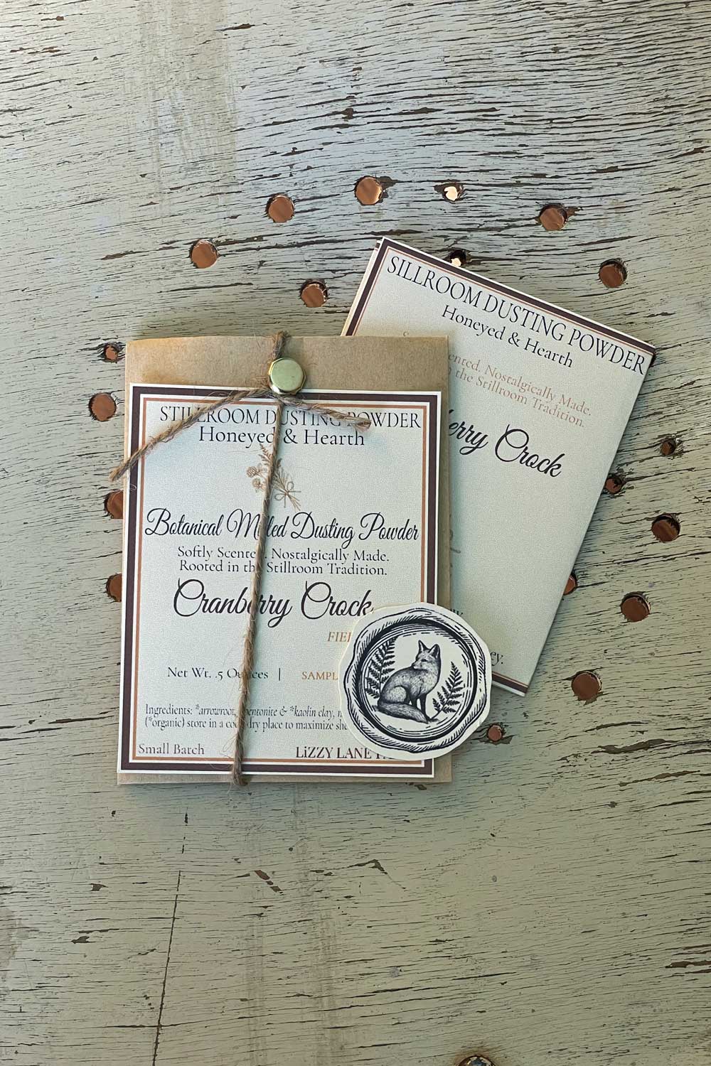 Fall Dusting Powder sample envelop of cranberry crock.
