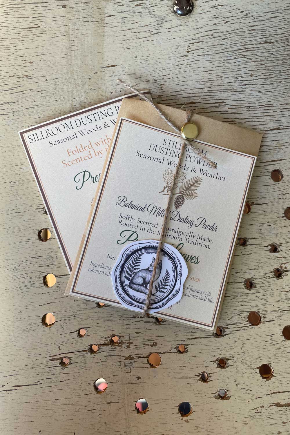Stillroom Style botanical milled dusting powder, in our exclusive Pressed Leaves scent. Our sample size envelope and limited series information card.