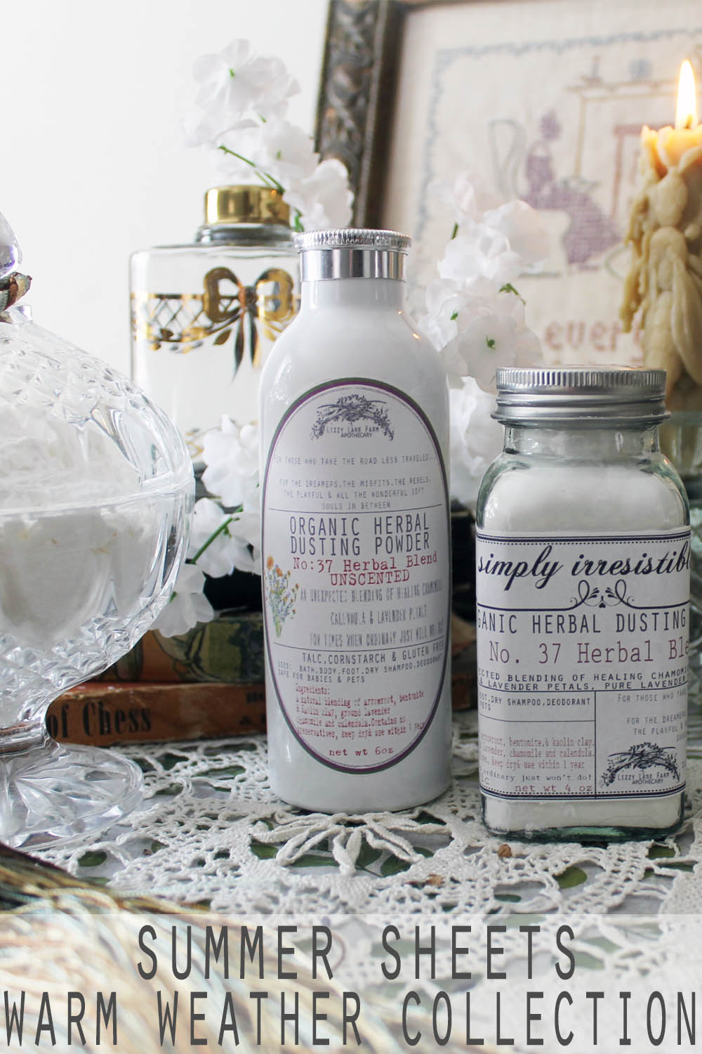 Vintage glass and aluminum shaker bottles sit on a wooden dresser, surrounded by folded linen and lace. Sunlight filters through a window, evoking the scent of fresh, sun-dried sheets.