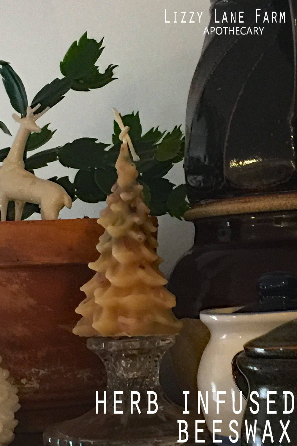 yule tree, christmas tree candle. rose and bay leaf herb