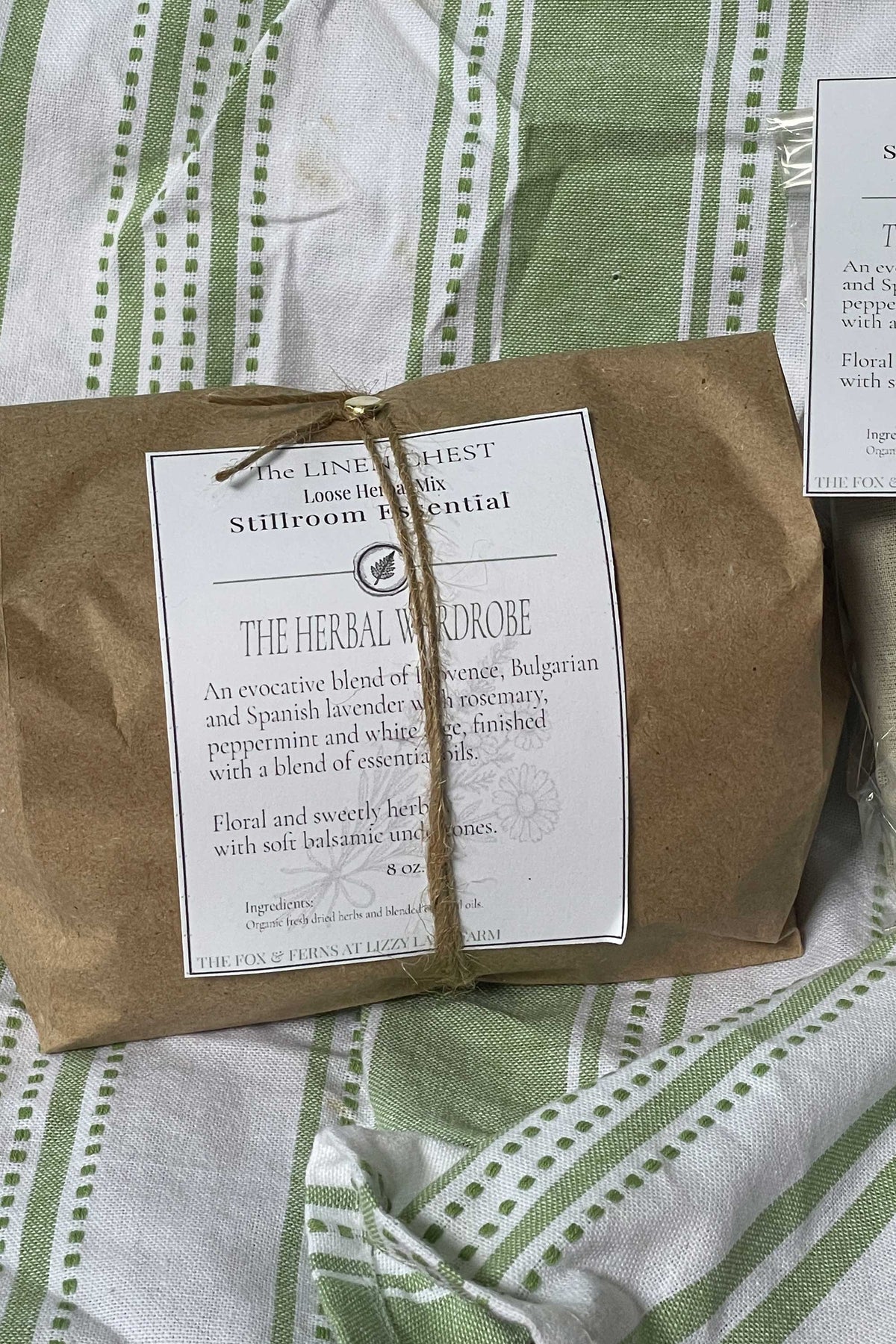 the herbal wardrobe herbal blend packaged in kraft paper and twine