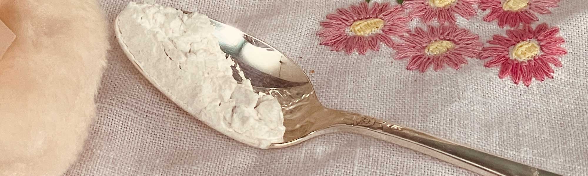 why stillroom dusting powder, vintage spoon with dusting powder on vanity table
