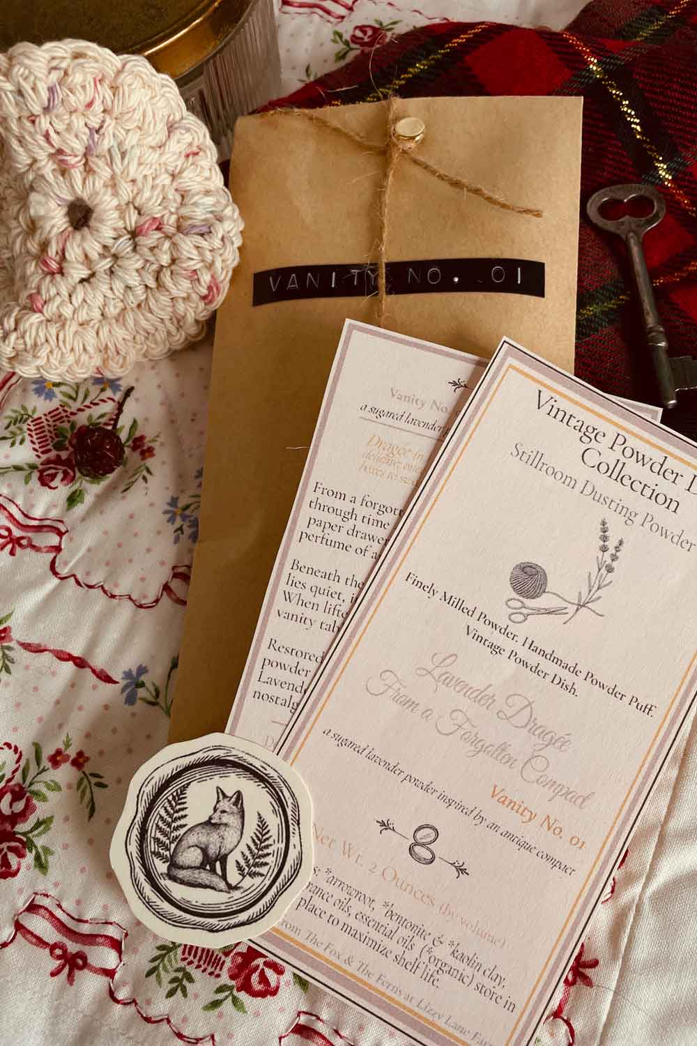 Stillroom Archive packaging for the Vintage Powder Dish Collection — handmade puff, cards, and fox seal.