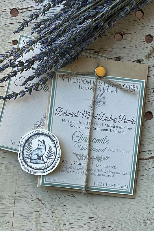Field No. 106 Chamomile Unadorned Dusting Powder — unscented sample in kraft coin envelope with brass clasp, twine, and fox seal. Herb & Oil Infused talc-free body powder, part of the Stillroom Archive Collection.