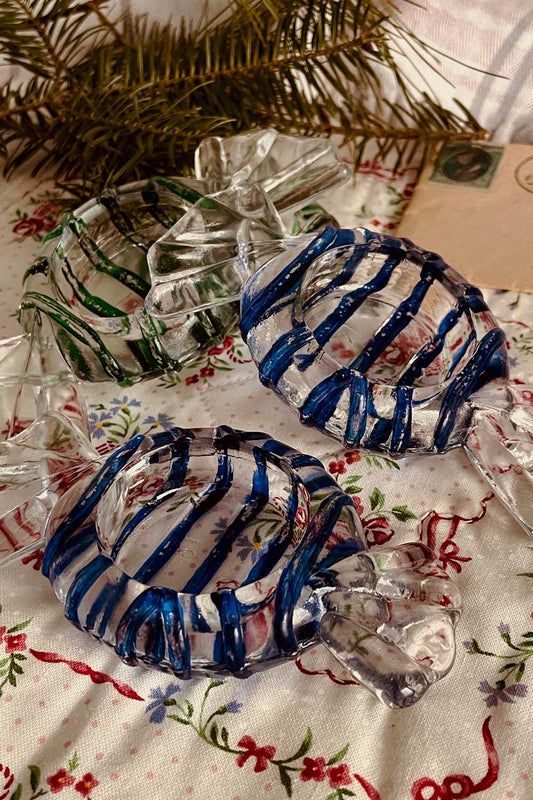 Vintage glass candy-shaped tealight holders in blue and green, restored holiday decor from Lizzy Lane Farm Apothecary. Cottage-core Christmas candle holders with hand-painted swirl stripes.
