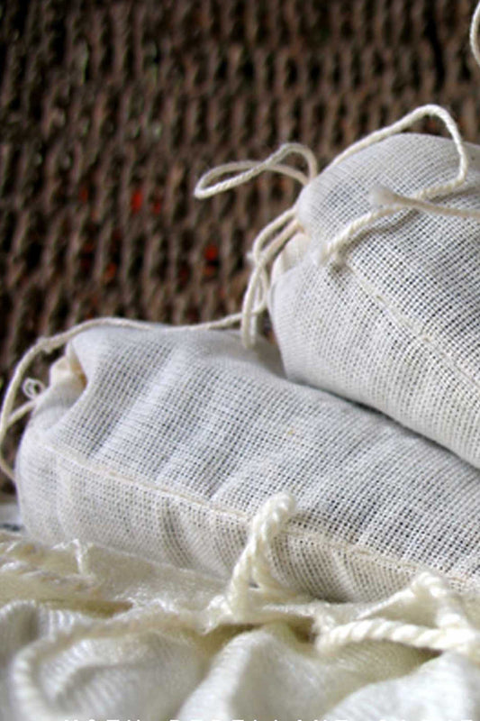 herbal wardrobe sachets in a wicker basket