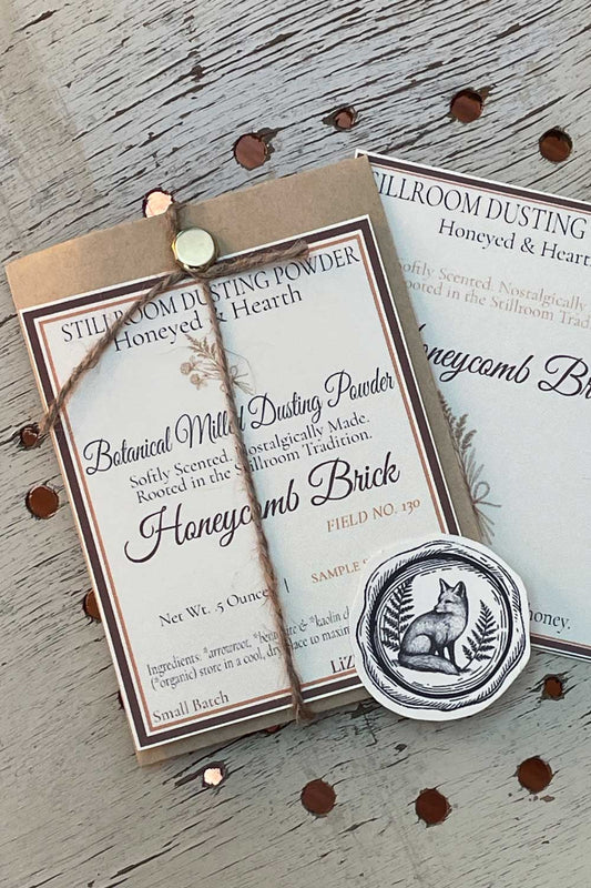 Honeycomb brick seasonal dusting powder with packaging and a seal on a wooden surface