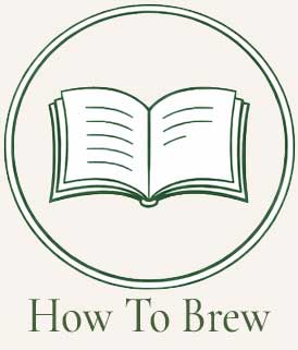 Green line-drawn icon of an open book inside a circular frame, representing tea brewing guides and instructions.