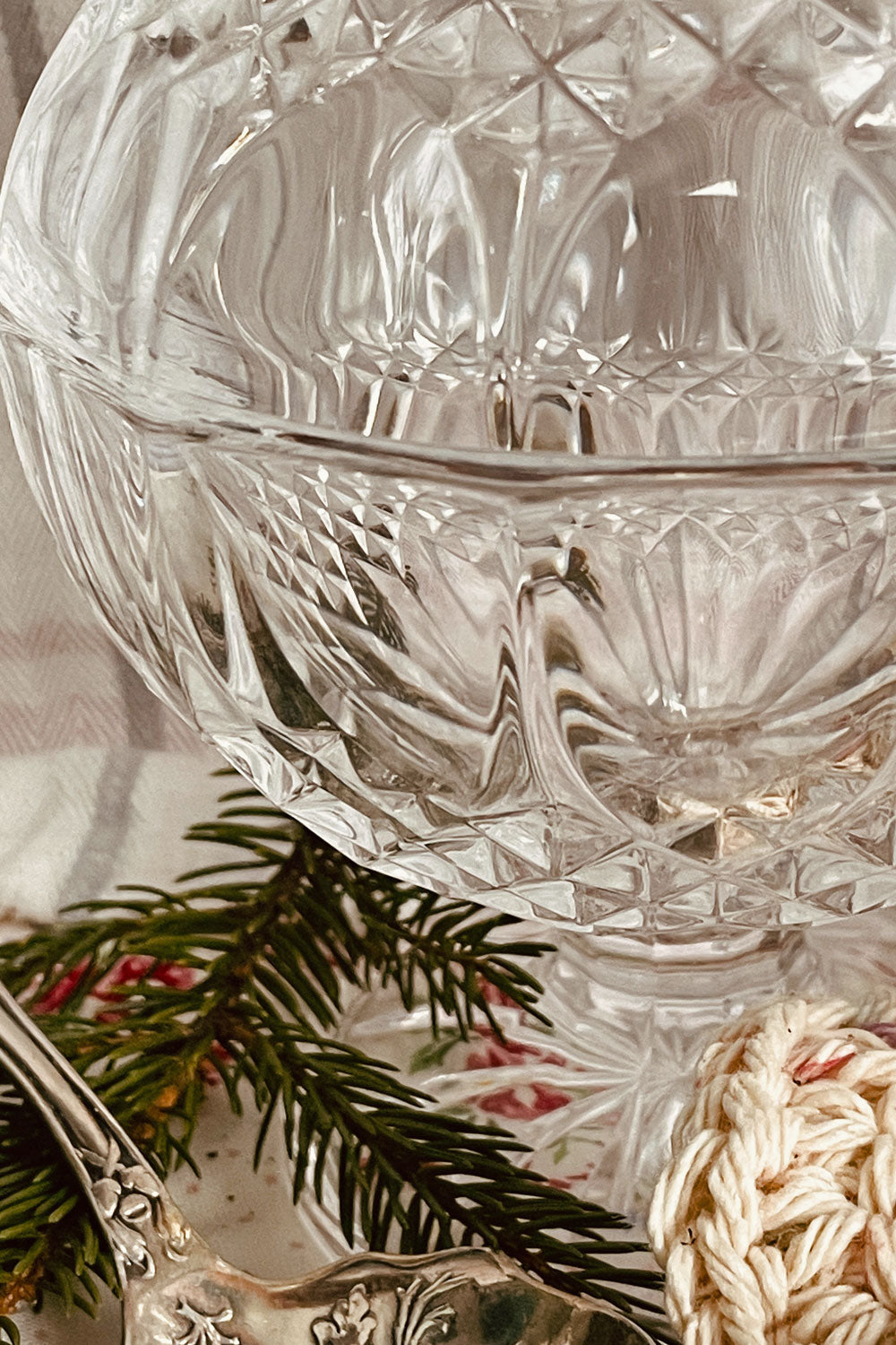 Close-up of Longchamp crystal pattern showing faceted cut glass detail.