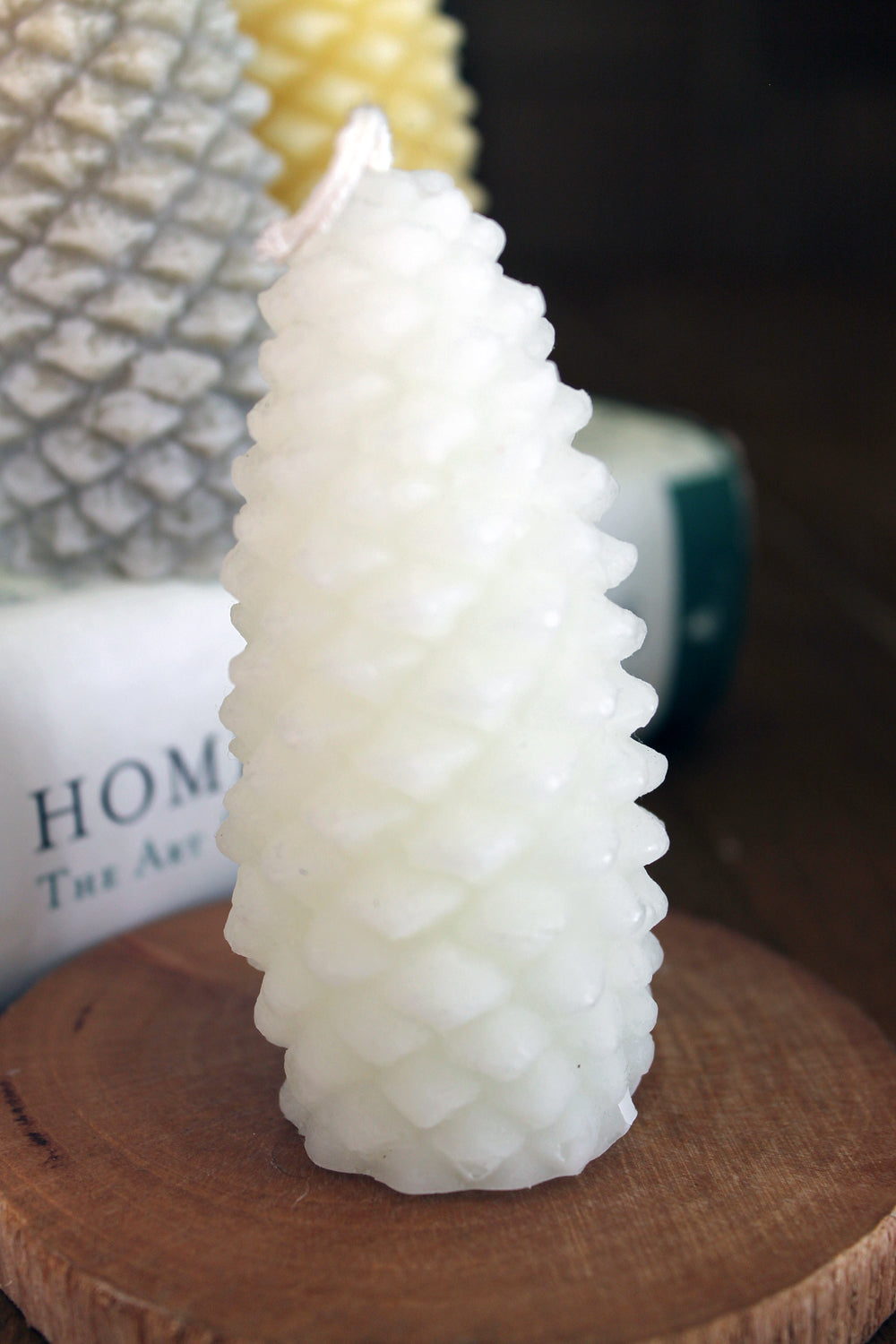 white beeswax pinecone candle