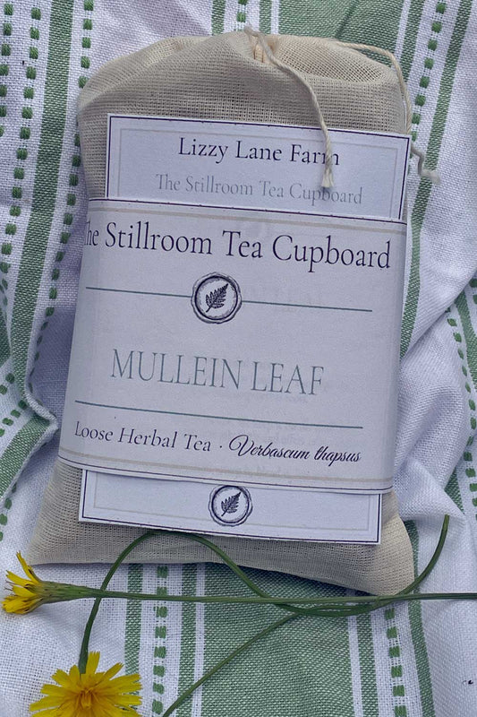 Loose mullein leaf tea in a muslin bag with label and brewing instructions