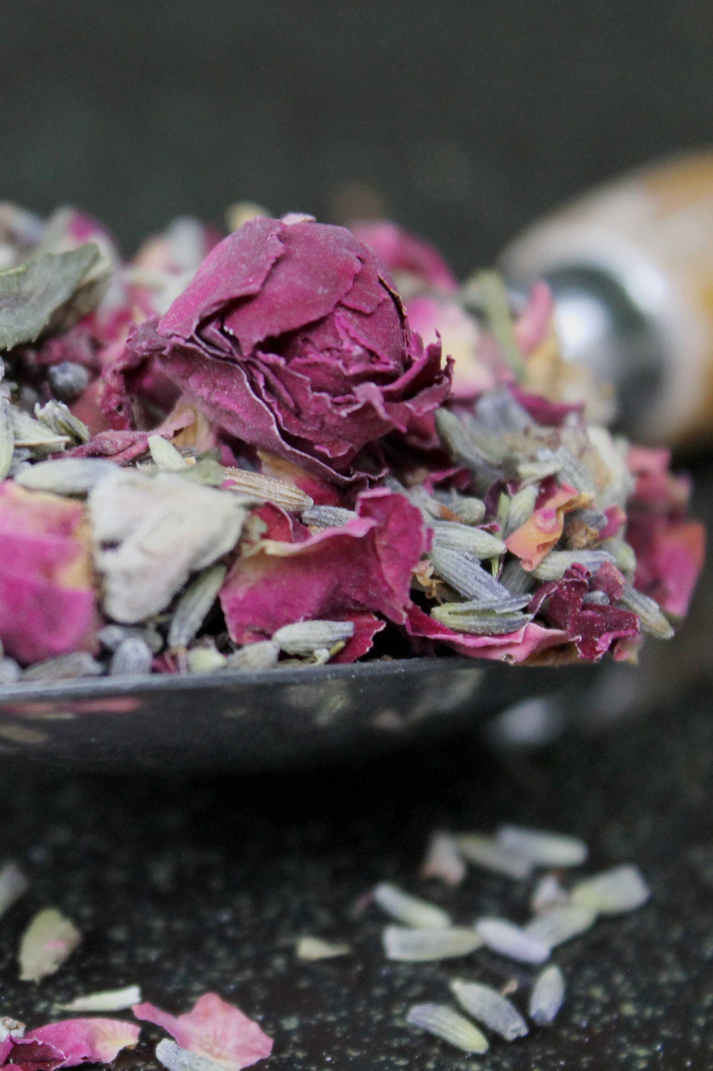Red rosebuds and dried lavender buds in a vintage spoon, Field No. 301 Red Rose & Lavender potpourri from the Linen Chest collection