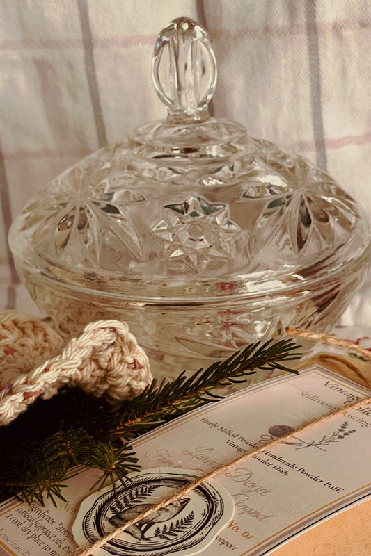 Vintage Anchor Hocking ‘Star of David’ pressed glass powder dish with ornate lid, styled on winter quilt with evergreen sprig and Stillroom Archive cards — Christmas vintage vanity gift.