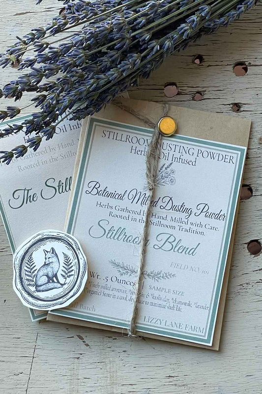 Field No. 101 Stillroom Blend Dusting Powder — sample size in kraft coin envelope with brass clasp, twine, and fox seal. Herb & Oil Infused talc-free body powder, part of the Stillroom Archive Collection.