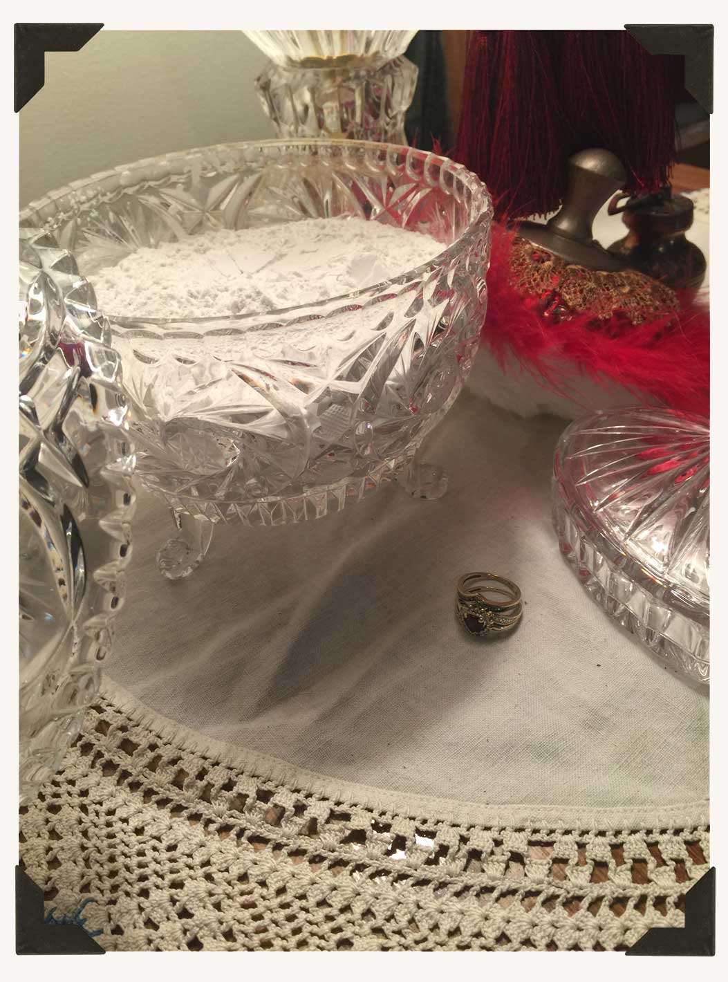 Freshly milled dusting powder available in bulk, resting in a vintage powder dish