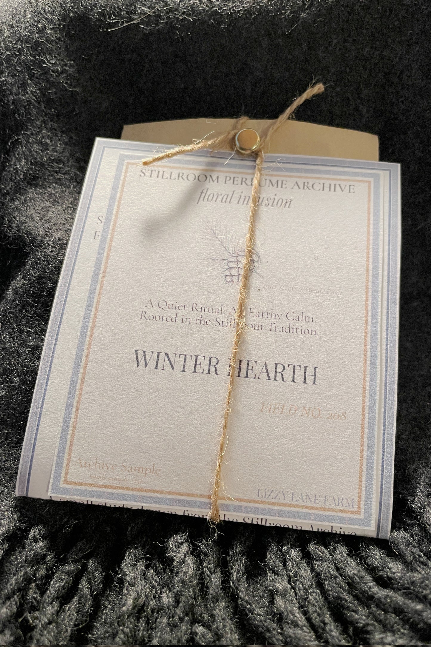 winter hearth perfume oil sample oil packaging wrapped kraft, twine and labels