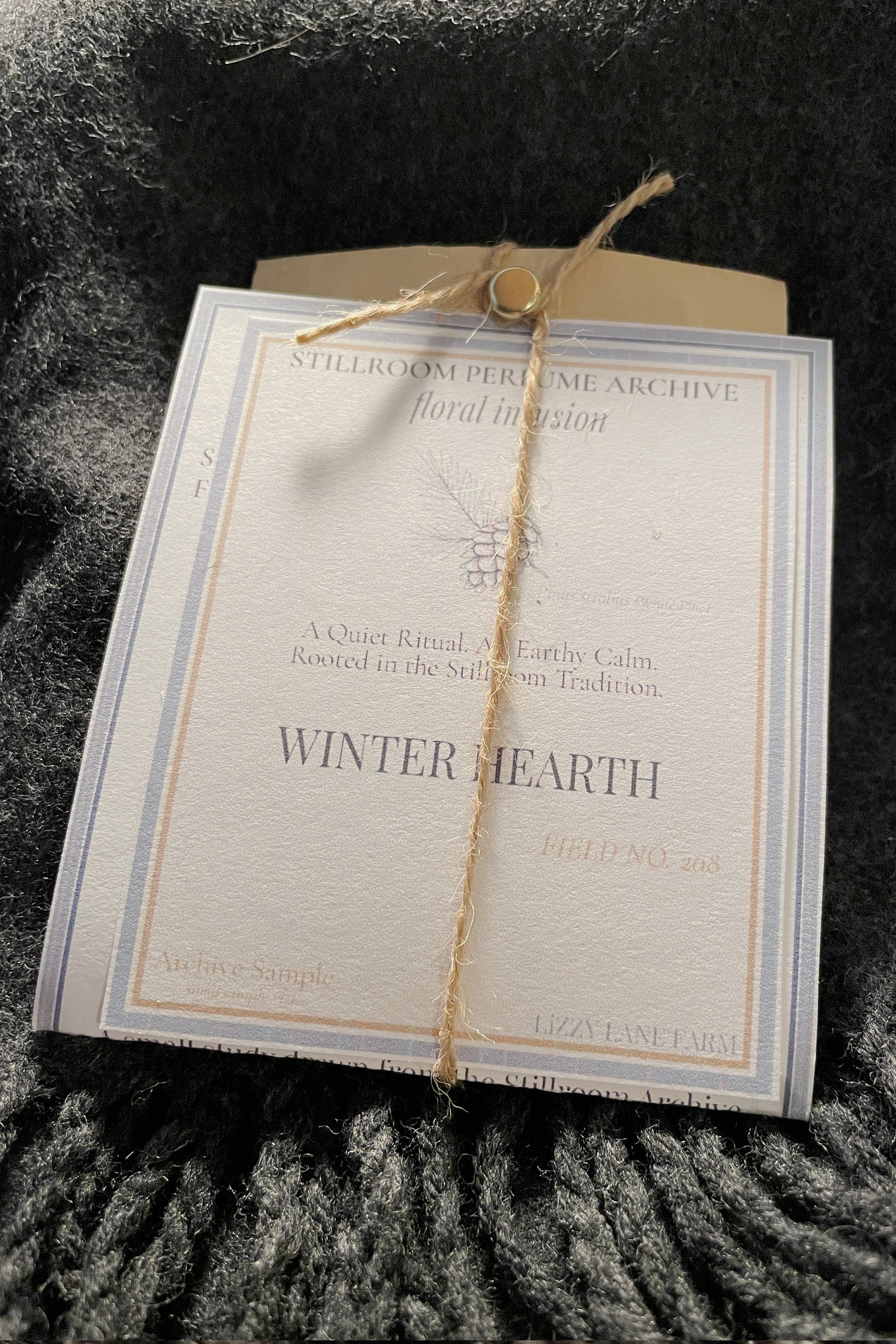 winter hearth perfume oil sample oil packaging wrapped kraft, twine and labels