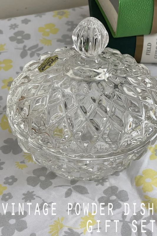 Close-up of the top of the Anchor Hocking Early American powder dish, highlighting the intricate finial and pressed glass details.