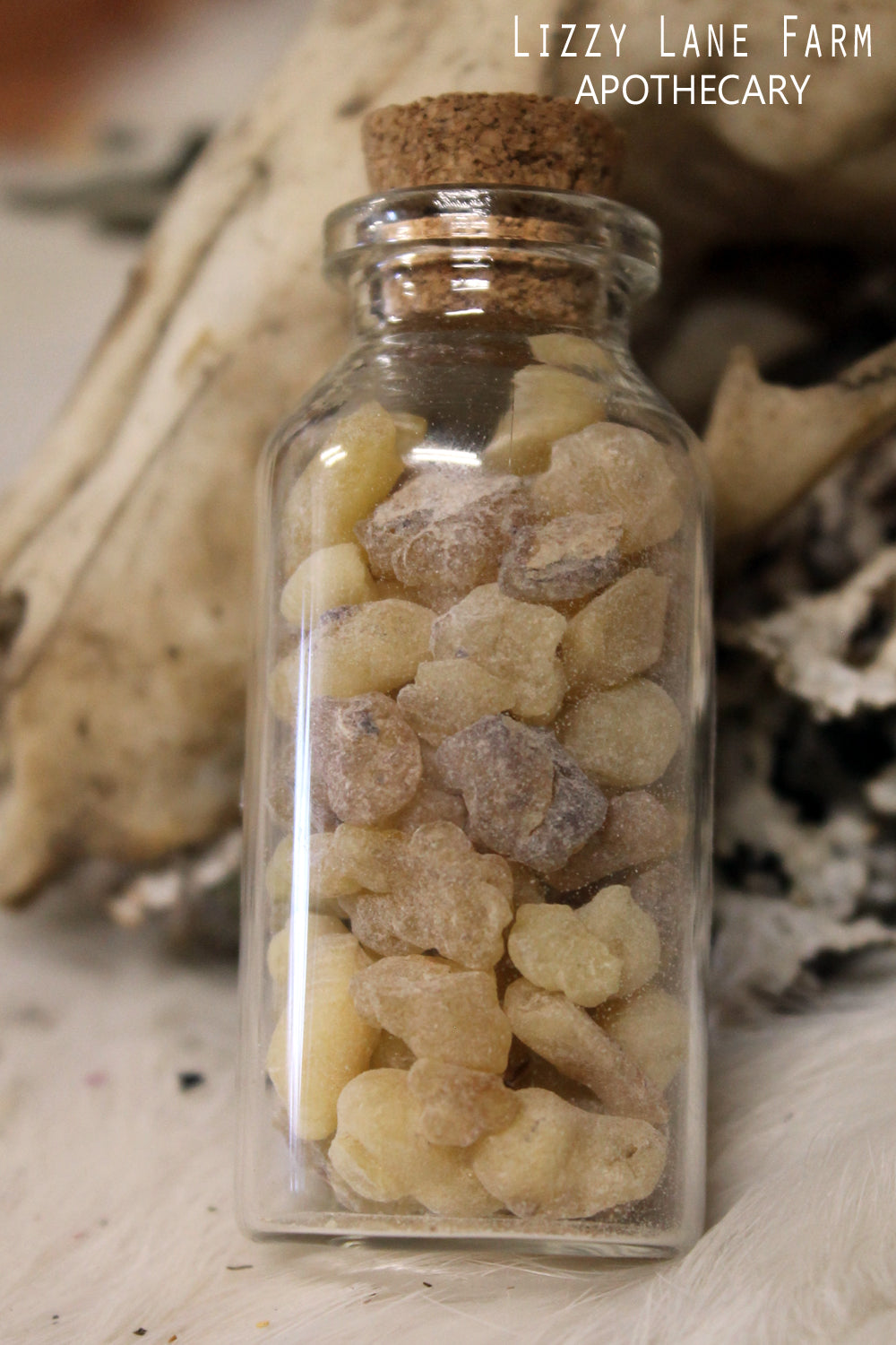 Apothecary bottle filled with 100% pure natural organic Frankincense resin, featuring a vintage-style apothecary label